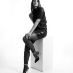 Aastha Sharma Instagram - Aastha Sharma says: “Whether today or in the yesteryears, the little black dress has always been a woman’s safe space – you can be as experimental or as minimalistic as you like. I’m wearing this classic short structured dress with stockings and statement jewellery because my personal style is minimalistic. For the party season, I’d go for statement shoes or a bag with my LBD, and minimum make-up, like a hint of lip colour” Since time immemorial, the little black dress has saved women everywhere from the ‘what to wear’ dilemma – and never once made it feel repetitive. To celebrate the season of parties, holidays, and all things glam, eight purveyors of fashion who call the shots on the fits of all our favourite A-listers pick their go-to LBDs, and show you how to suit the iconic style to your own liking. Photograph: Yusuf Lokhandwala Fashion Stylist: Nishtha Parwani Hair and Make-up: LOOKS Salon Hospitality: Lil Gamby and PCO [LDB, Little Black Dress, Festive Dressing]