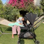 Aastha Sharma Instagram - First work trip with this little monkey who’s turning 1 and I can’t believe it’s almost a year with this cuteness ❤️🧿❤️ Thank you @nuna_india @dinky_nirh he’s clearly obsessed with his stroller ❤️ Also thank you @ashidua masi and Rahil for making me look like a stud in this jacket. We love you 🥰