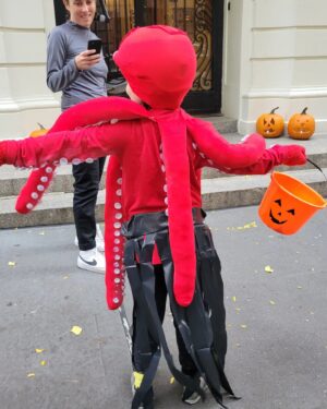Abigail Savage Instagram - A good Halloween last night! An octopus costume as cool from the back as from the front; great pumpkin display in Grace Court Alley as per usual, and the celebratory ordering of the candy haul afterwards.