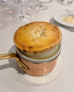 Aiste Miseviciute Instagram - One of my favorite dining experiences recently was at the one Michelin starred Saddle @saddlemadrid in Madrid, which now occupies the former location of the renowned Jockey restaurant. Jockey, a historical landmark in Spain's gastronomic, political, and cultural scene, operated from 1945 to 2012 under Clolado Cortés, who revolutionized hospitality by prioritizing the diner's experience. In October 2019, Saddle opened as a tribute to Jockey's legacy, focusing on French haute cuisine that highlights seasonal ingredients at their prime. Led by chef Pablo Laya, Saddle is dedicated to honoring culinary traditions, especially by showcasing produce when it's in season.

- Amazing, slowly roasted veal shank, tribute to the legendary chef Santi Santamaría, with potato purée and beef jus
- Butter service
- A very generous portion of Maresme teardrop green peas (gold standard of peas) and Tokaji Oremus wine sabayon
- White asparagus from Navarra, sea urchin, smoked egg yolk and vegetables soup
- The excellent wine pairing by @patrickfonsek 
- Souffé Grand Marnier
- The very impressive spirits trolley