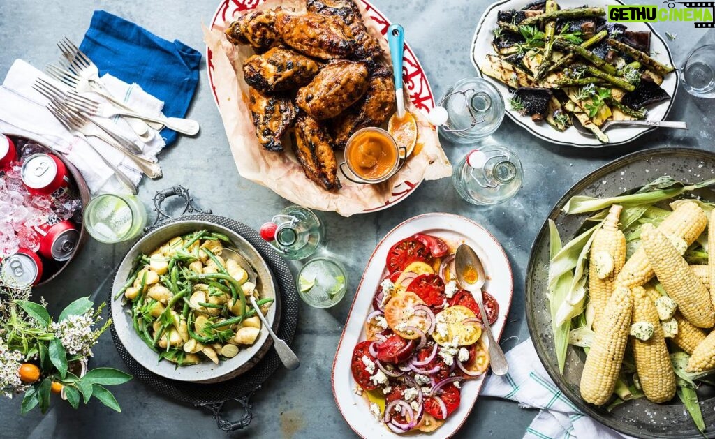 Ali Larter Instagram - Summer bbq spread! Grilled chicken with peach bbq sauce, buttery corn, sliced heirlooms with blue, mustardy potato salad with green beans, and a bucket of cold brews. Which is your first bite?
