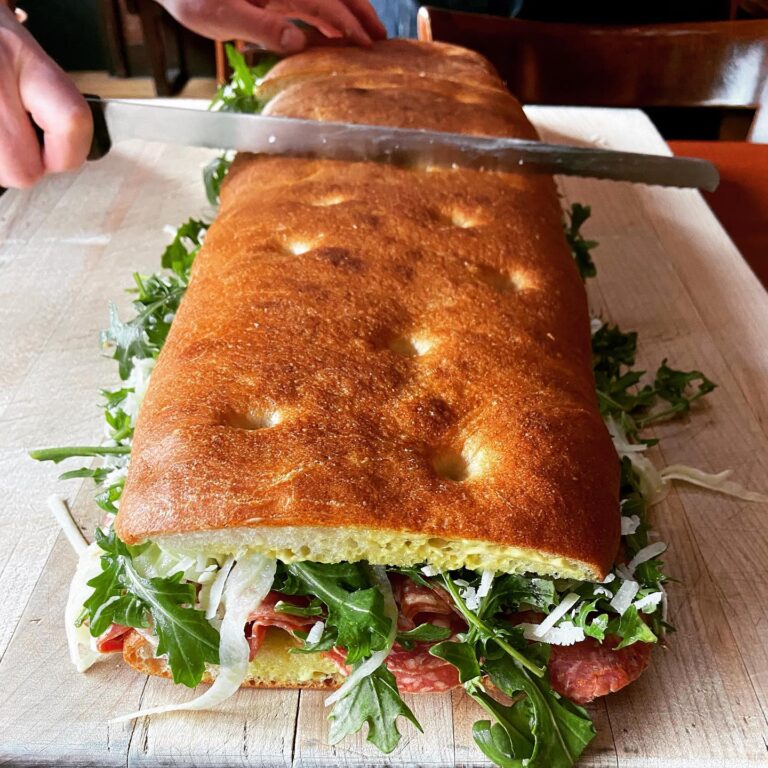 Alice Waters Instagram - I love the sandwiches made on the Acme pizza bianca! There is always more filling than bread: the secret of a great sandwich. Bartavelle Cafe has shown us the way with salami, shaved fennel, aïoli and lots of rocket! And now we are making 