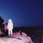 Alison Sudol Instagram – still from the archives – on location for the moon video directed by me shot by @samuelaaronbennett with @estuary_artists in the California desert with a bear flashlight, pink gels, duct tape and a space suit 2017