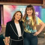 Ally Maki Instagram - Movie games and pregnant life on @kellyclarksonshow TODAY! The best combo. A forever memory that our little baby girl and I got to do the show together in NY! We love you @kellyclarkson 🫶 Tune in!
