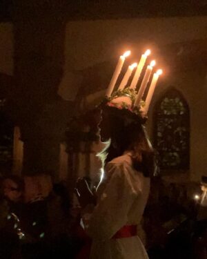 Amalia Holm Bjelke Instagram - Having been a choir child in Sweden I can’t let the 13th of December pass without joining in on some kind of Lucia celebrations. Last year in Vancouver, me and lingo-genius @arlenaguayostewart rehearsed the Lucia song lyric (for days) in the green room on set, brought @ashleynicolewilliams in on the tune and ever eager @sherrylrandall was on top of getting us something resembling Lucia-equipment. The intention was to surprise the crew in the dark factory building (which had excellent acoustics) as we were completing episode 2 of @motherlandtv season 3. But film set logistics are NOT to be screwed with and the risk of our innocent Lucia gimmick ruining anything on that tight schedule was simply not worth it on the day. For another time! This year I’m at home and getting the full experience, as part of a wonderful and tight choir. The duet in the video by me and Maria is a welcoming song as Lucia strides towards us, portrayed gracefully by my friend @nikiblomberg. Joyful moment af. As I’m catching up on Lucia celebrations lost and just hate to see great acoustics not be utilized, I also made a little Lucia-celebration for the neighbors in the 120 year old stairwell of our building on the morning of. (The elevator note says to open your apartment door if you want to hear the Lucia songs). The meaning of Lucia celebrations is to bring light and hope in (literal) dark times. 🕯️ Happy Lucia! 🕯️
