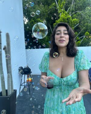 Amanda Lehan-Canto Instagram - GET OUTSIDE…it’s golden hour 🫧 🌞 
#shourtney2024 #bubblemachine #thereaping 

Congratulations @co_mill & @shaynetopp we love you!