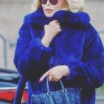 Amanda Lear Instagram - Freezing..fake fur and Dior bag #fashionweek #kimjones #
