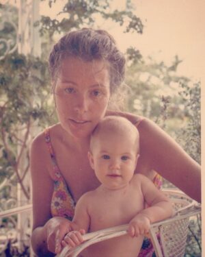 Amanda Palmer Instagram - 1977. Me and my mom, Kathy, at her mom and dad’s house right before my 1st birthday. 

With our hair up, we’re doppelgängers. 

No idea how she was keeping it together and looking so serene in this photo. 

She had a baby (me) and a 5 year old (my older sister) and she was on the brink of getting divorced from my dad (Jack). 

After the last few years of my own life navigating divorce and a small kid, I’m starting to slowly understand so much more. 

I love you, mom. A ton. 

Love you too, dad. 

To every parent, especially the solo, widowed and divorcing ones: you’re doing a great job. It’s a mess. 

Just keep going. 

What a ride. 

♥️💐♥️