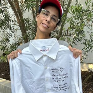 Amanda Palmer Instagram - It wasn’t me who chose the lyric, but “I’d like to do more than survive, I’d like to rub it in your face” for a quote to be embroidered on a shirt to raise funds for Abortion Access Front (@abortionfront) seems very logical. I am HONORED AF to be joining forces with @sarahkatesilverman, @jamieleecurtis, @margaret_cho, @stevienicks, @sandragbernhard, @nekocaseofficial, @busyphilipps and more to raise funds for this critical cause. All of us provided a quote, the quote was embroidered onto a vintage shirt, and all the shirts are up for auction. The auction closes May 16th so go FAST and bid. Your dollars will towards the endless battle to make sure people can access safe and legal abortion in our country. It’s getting more and more important every day. Dig deep and bid high. If you win this shirt and bring it to a show I promise I will personally also make it out to you and draw a dick on it if you want. Link to the auction in stories and in the @abortionfront feed. 

Thanks to @mwmccomiskey for taking the shots of me and to @lizzwinstead for putting this epic idea together. GO BID.