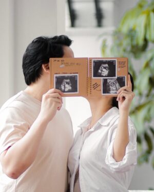 Amander Liew Instagram - First post of 2024 and we’re happy to announce that we are expecting our first child to be arriving in June this year 🥹❤️
⠀
It’s been a rollercoaster of a journey and we’re glad that things are finally stable enough to share with everyone.
Check out the latest video on my channel for updates on how the First Trimester has been for us ✨
⠀
📷: @anaxalbums 
⠀
Will baby be a boy or a girl?
.
.
.
.
#pregnancy #motherhood #pregnancyannouncement #pregnancysg #pregnancylife #pregnancyfashion