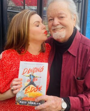 Amber Tamblyn Instagram - Happy publication to my amazing papa, @officialrusstamblyn who is publishing his first book today at 89 years old. Don’t ever say you’re too old to accomplish one of your life-long dreams. So proud of you, dad. These stories about your life as an artist are unparalleled: sharing the screen with Elizabeth Taylor, teaching Elvis Presley some of his most famous dance moves, and smuggling Paul Newman off the MGM lot in the trunk of your car. And that’s just the first three chapters. 

Extra big shoutout to his co-writer, the brilliant Sarah Tomlinson, and Blackstone Publishing. Link in my bio to order your copy today! #RussTamblyn
#WhenYoureAJet
#DancingOnTheEdge