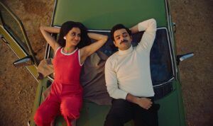 Amrit Kaur Instagram - This is regularly how I gaze at my fellow @gracemoonarts company member Hamza Haq, with love, and in awe, simultaneously brainstorming ways to annoy him. And we got to do a movie together 🤎

Happy TIFF opening to #thequeenofmydreams and to a king, @hmzlhq.