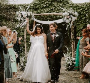 Amy Maghera Instagram - So much to express!
This time last week I married my best friend Ethan Taub!!! Here is a picture of the happiest day of my life, surrounded by our dearest family and friends. Inside me is also another little heart beating 🤰🏽😃 More to post soon. Thank you God 🙏🏼 ❤️
Make up and hair: @ambreenmakeup 
Photo: @hannah_lightpainter
Flowers: @lilysflowers1 
Celebrant: Nicola West