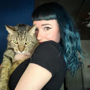 Amy Shira Teitel Instagram - Blue hair. Pete doesn’t care. #cat #author