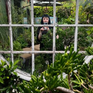 Amy Shira Teitel Instagram - Deeply satisfying selfie from the garden I where I had a shoot last week. Tiny space. Almost exclusively giant potted plants. I love these lush little enclosures! #author #streamer