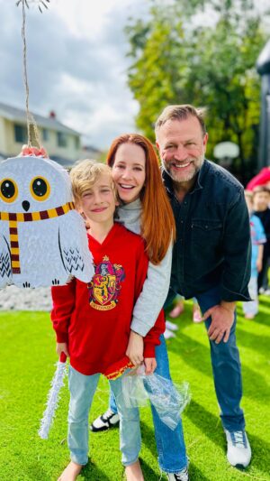Amy Davidson Instagram - What a magical 8th birthday Lennox ended up having. ✨ We were nervous about the weather to say the least! 🤪🤞🏻The rainstorm was very apropos for Hogwarts and definitely added to the Harry Potter theme.⚡️🌩️🪄🏯⛈️

There were so many elements that made Lennox's birthday party special. Not only did @sweetcakeryla make the most magnificent cake, but they ALSO made the coolest cake pops and chocolate covered strawberries I've ever seen. 🍓🍥So many details went into the cake and sweet treats and it was definitely one of the biggest hits of the party! From the sideways rain, to the sun coming out, to the successful Pinata and black castle bouncy house, to being packed like sardines in the house during the storm and enjoying charcuterie, pizza and wine and the crazy cool bouquets from @petaldriven , I couldn't have asked for a more magical day for Lennox. OK, I guess I could've asked for no rain,😳 but again, it definitely added to the spirit of the party!😂⛈️⚡️🪄

happy, happy, happy 8th birthday sweet Lennox! We love you more than you'll ever know, our little Wizard in training. 🪄⚡️

what would you do if a major storm coincides with a big outdoor event?
