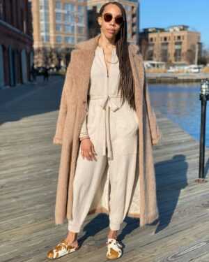 Amy Sherald Instagram - Mastering getting “dressed up” while still holding on to the feeling of being in my pjs. #comfortzone Coat and satin dress and sweater @michellesmithnyc Thanks Michelle 😘📸: @mr._pemberton