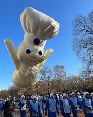 Ana Gasteyer Instagram - Kicking off the holiday season. In style with a selfie of me and my muse the #pillsburydoughboy, that looks like my mom took it! What a gorgeous year at the Macy’s Parade!! Happy Thanksgiving 🦃🍁 #macysparade #selfie #noBotox