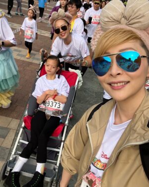 Angela Tong Instagram - Our girls ran towards the finish line, leaving only me, my bestie Margaret and my goddaughter Isabella behind. We enjoyed the scenic marathon taking selfies here n there! So happy Alyssa waited for me to cross the finish line…. While my brother Anthony & Kassidy & Michela ate bananas with their medals waiting for us! Thank you Amy for all these wonderful memories! #3KDisneylandMarathon  #10KWeekend2023 #HKDisneyland #香港迪士尼樂園 #DisneyMomentsHK #SkechersHK #linabell #alyssakassidy