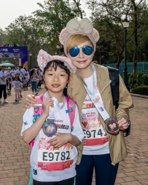 Angela Tong Instagram - Our girls ran towards the finish line, leaving only me, my bestie Margaret and my goddaughter Isabella behind. We enjoyed the scenic marathon taking selfies here n there! So happy Alyssa waited for me to cross the finish line…. While my brother Anthony & Kassidy & Michela ate bananas with their medals waiting for us! Thank you Amy for all these wonderful memories! #3KDisneylandMarathon  #10KWeekend2023 #HKDisneyland #香港迪士尼樂園 #DisneyMomentsHK #SkechersHK #linabell #alyssakassidy