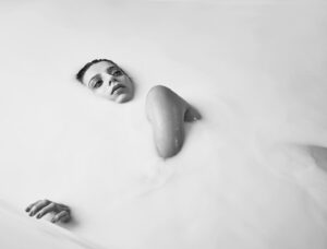 Angela Sarafyan Instagram - “Skin Deep” 
🥛
Loved this Collab with 
@robertascroft 

We met years ago at the Emmy’s, where he’d taken this stunning photo in the @csiriano starry night gown.

We stayed in touch to think of what may be a creative collaboration we can get involved in together. He mentioned he had an idea for a long time he was hoping to explore and … it evolved into our shoot that you can see here.

Sterility & Softness in lighting, the involvement with music and dance … it was a moment in time captured on film. 

Enjoy!