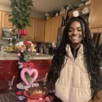 Aniela Gumbs Instagram – Hope you had a great Valentines Day 💕💕💕 
I turned 15 and I’m old 😂 #anielagumbs hugs and kisses to you #kisses #chocolate #hugs #snuggles #zola #like #comment #follow #valentinesday #birthday #fit #cute #carnations #love