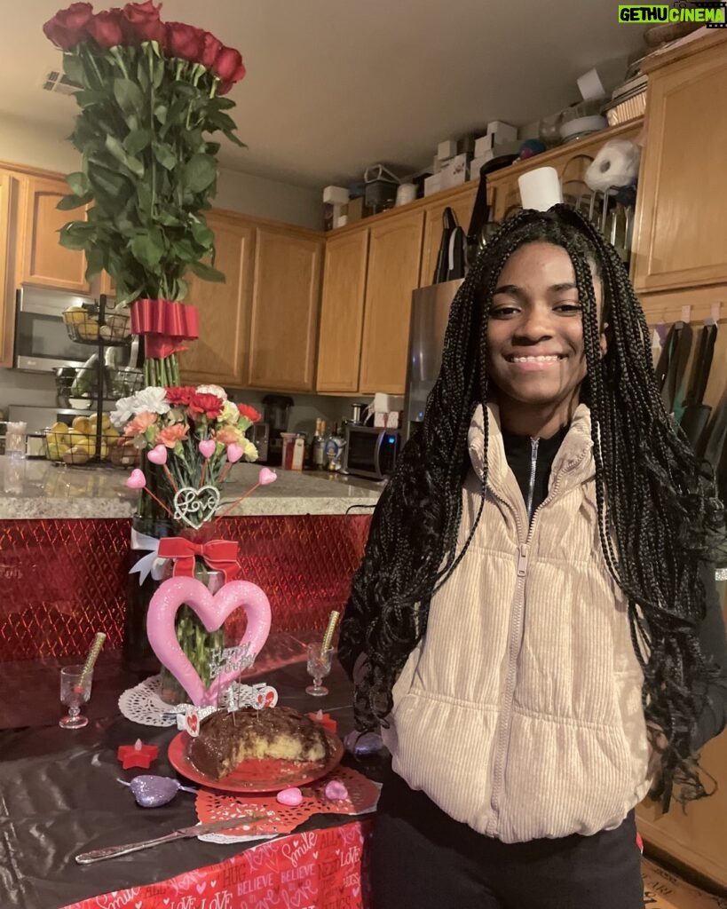 Aniela Gumbs Instagram - Hope you had a great Valentines Day 💕💕💕 I turned 15 and I’m old 😂 #anielagumbs hugs and kisses to you #kisses #chocolate #hugs #snuggles #zola #like #comment #follow #valentinesday #birthday #fit #cute #carnations #love