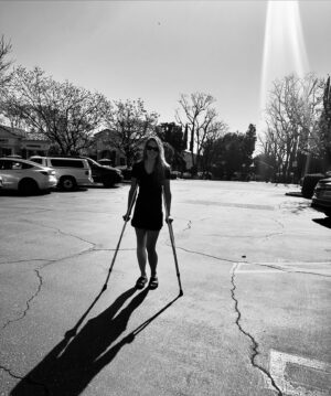 Anna Hutchison Instagram - I was training for a marathon, LA March 17,
When I received a call to film the job of my dreams!
Didn’t wanna waste my marathon training so,
I pulled forward my race 2 weeks, SoCal River Marathon- Let’s GO!
My hip had been a little sore but as they say,
‘No pain, no gain’- ‘Get out of your own way’!
I woke up early that morning had coffee, oatmeal, did poos,
And against my better judgment, I laced up my running shoes.
I was feeling great the first 15 miles of the race,
Was second female in the field, I’d be first when I picked up my pace.
But my wee hip intensified in pain,
I started slowing down, as it started to rain.
I called up my hubby who was planning to meet me at the finish line,
He said- ‘You’ve just ‘hit the wall’, you’ll be fine!’
I hobbled along for a few miles more,
Until I could no longer walk anymore.
So instead of finishing the race Boston Qualifyin’,
I was picked up in a Walmart parking lot cryin’.
Femoral Neck Stress Fracture is what the MRI found.
I was told that I needed a hip replacement to be safe and sound.
Luckily for me, healing bones is my super power!
Alternative recovery requires me non weight bearing, in order to flower.
I’m so grateful for all the amazing help I’ve received.
And dam you marathon goal, one day you WILL be achieved.
You may know me as Anna Hutchison,
But as I recover, feel free to call me-
‘Miss CRUTCHESon’.
😅