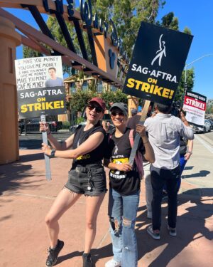 Anna Brisbin Instagram - STRIKE IS OVER! At least, suspended! These past 118 days have been ROUGH but it’s been so inspiring to join forces with my fellow actors for the future of ALL actors. 🥹 Crossing my fingers that the deal our negotiators agreed to is what we needed and that we won’t have to do this again for a longgg longgg time. (Though we’ll see when it comes to videogames shortly… lol) I can finally speak freely about the media I love without worrying about accidentally promoting a struck project and that is SO LIBERATING LMAO so I’m just gonna take this opportunity to tell everyone who loves horror or Edgar Allen Poe to watch Fall of the House of Usher. 

And I want to give a special shout-out to any non-union influencers who voluntarily chose to stop talking about struck projects in solidarity, often at the cost of your income. 🥹 You didn’t have to do that but it meant so much.

It was an honor to picket with you, my union friends. 🤍 #SAGAFTRAstrong #strikeisover 

and also yes i obviously dressed up for the Barbie Movie. 💖