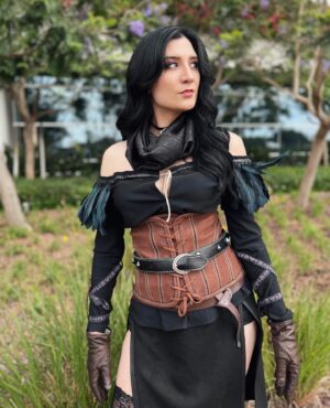 Anna Brisbin Instagram - Gave my Yennefer cosplay from The Witcher 3 some serious upgrades and put it all together for Comic Con. And she just might be one of my fav cosplays so far? Idk but I’m def not done with her. Gotta bring her to ren faire or something…. 

Photo: @tessanetting 
Top and Skirt: ShopCosplayCostume on etsy 
Corset and waist belt: CraftShopMorgana on etsy 
Knee Armor: file by @victoriahofferson, printed by @jameschatstv 
Purple contacts: @pinkyparadisedotcom 

#yennefer #sdcc #comiccon #witcher #witcher3 #cosplay