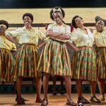 Anna Shaffer Instagram - It’s giving…I’m in actual love with these women! 1986 called and it really said SLEEVES 🤩. Thank you @jjbioh @mons_about @chescmood @jesschase19 for the gift of this role. I can’t believe we are now OPEN, I am so proud of US. This show is unique. It’s so fun and playful and devastating, it shows blackness in all of its complexity and joyfullness. And THE COSTUMES. Come onnnn. Come and see our show! It’s really bonkers and really good! 🎟️ link in bio 🎟️ #SchoolGirlsOrTheAfricanMeanGirlsPlay @lyrichammersmith