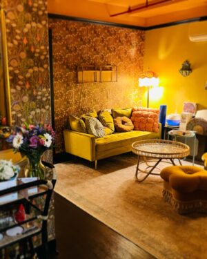 Annaleigh Ashford Instagram - My dressing room was made dreamy by the brilliant Heather as @sundaysupperclubcreative ❤️ She made it magical and found me some nice cheery wallpaper with gilly flowers and daisies. Thank you @jennifertaylorhome for our fabulous poufs. We wore them out puzzling and playing ❤️