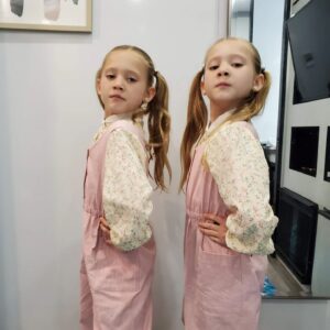 Anniston Price Instagram - Some #bts of @strangerthingstv ! Gotta shout out to the hair and makeup artists too! They are incredible and some of the most creative and meticulous innovators out there. 
 
FUN FACT: Even though we are twins, our freckles and moles are different on our faces. Makeup knows EVERY single freckle on our faces, and they paint each one on to match the other. 😲 #details