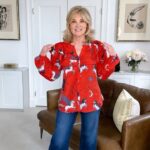 Anthea Turner Instagram – A lot of you have been commenting about this red top from my friend @toniabuxton brand @templeofrhapso ❤️ Such a great top that’s light weight and easy to wear, she also has some beautiful dresses in the same fabric which is creaseless. I had it folded in my bag when I went to Crete pulled it out and it didn’t even a freshen up, put it straight on and was good to go. If you want to stand out in a photograph wear red, be brave and wear this bold colour. I love it! 

Use code ANTHEA for 10% off! 

Video 
Jeans – @paige 
Shoes – @ralphlauren via @brandalleyuk 

Crete Pictures 
Trousers – (bought in 2006) @raychelroberts 
Bag – @lulu_guinness 
Shoes – @penelopechilvers