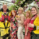 Anthea Turner Instagram – Few pictures here to show you one of my big reasons for popping over to @rhschelsea this year.

It was to help champion rose breeder 
Ian Limmer of @peterbealesroses launch his new baby.

This beautiful cluster rose called ‘With Courage’ will help raise ‘hopefully’ around 40k for the @rnli 

As you know, Blue Peter has a long history of support for the RNLI

During my time on the show I took part in many of their training exercises, so many in fact I had my own uniform!! 

30 years later I wore it proudly again and for the last time as I’ve donated it compleat with badges to the RNLI Museum in Tenby Pembrokeshire – The place aged 6 with Dad I watched my first launch.

It’s not there yet but when it is I’ll feel very proud 😊 

Obviously the BP fam were also there to help and just great to be with @lindseyjrussell and @missjanetellis 

Also a delight to meet another supporter @joannascanlanofficial 🎭

What a team !!🌺🌺🌺🌺