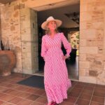 Anthea Turner Instagram – Feeling pretty in pink completely loving this gorgeous dress from @aspigalondon such an easy throw on number for holiday. Styled with of course a hat (which u will wear at all given opportunities) who doesn’t love a hat on holiday?

Pictures taken when filming @mistralsinglesgr in Crete last week 🇬🇷

Dress – @aspigalondon 
Flip flops – @havaianas