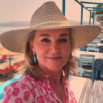 Anthea Turner Instagram – Feeling pretty in pink completely loving this gorgeous dress from @aspigalondon such an easy throw on number for holiday. Styled with of course a hat (which u will wear at all given opportunities) who doesn’t love a hat on holiday?

Pictures taken when filming @mistralsinglesgr in Crete last week 🇬🇷

Dress – @aspigalondon 
Flip flops – @havaianas