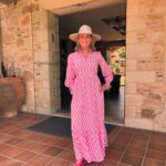 Anthea Turner Instagram – Feeling pretty in pink completely loving this gorgeous dress from @aspigalondon such an easy throw on number for holiday. Styled with of course a hat (which u will wear at all given opportunities) who doesn’t love a hat on holiday?

Pictures taken when filming @mistralsinglesgr in Crete last week 🇬🇷

Dress – @aspigalondon 
Flip flops – @havaianas