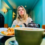 April Bowlby Instagram – English tea, blue wall, deep thoughts.