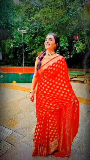 Archana Ananth Instagram - ❣️On a gray, rainy day--Wear RED❣️
.
.
.
.
VC:- @mani.bujji.353803 
Edit:- @radha_kancharlapalli_118 
#red #sareelove #tamil #azhageazhage #songs #instagood #reels #fitness #rainyday #cool #walk #feelhappy #feelgood #grace #universe #positivevibes