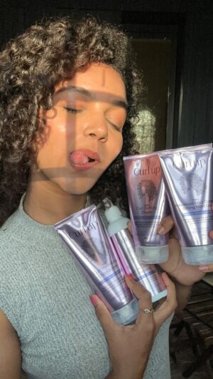 Archana Kumar Instagram - This video might be a little funnier but imagine this was the thing i faced during my childhood. I have had enough nicknames and bullying for how my hair looked and how frizzy it was.

From Straightening, smoothening, keratin treatment and hating my hair to loving my natural curls i have come across so many questions in my own mind on what and how do i maintain my natural hair. 

Curl up was the first shampoo and conditioner i decided to use after i learnt the CG method on maintaining curls from a lot n lot of videos.. It definitely didn’t disappoint me and i started to style my hair properly using @letscurlupdotcom 

Curls need more care than a straight one. Not everybody has a naturally fabulous hair textures it all depends on how you take care of it. I am taking care of mine. Are you??

To all my curly girls and guys out there Curl Up will definitely give you the moistured and nourishing curls you desire💜
Trust me i have been using that for long.

#straightfromheart #myfavshampooconditioner #curlup #letscurlup #letscurlupdotcom #archu #archanakumaar #curlygirl #curlyhair #curlyhairdontcare