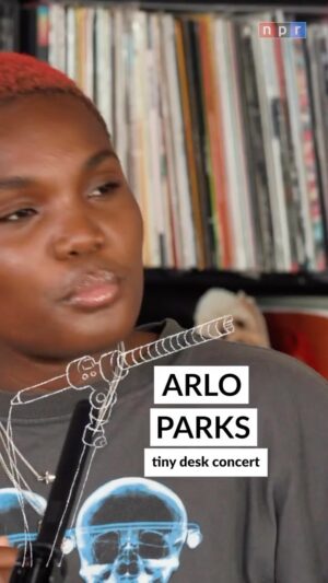 Arlo Parks Instagram - #tinydesk • Three years ago, with just a guitar in tow, @arlo.parks played Tiny Desk (Home). Two albums later, she’s made it official behind the real Desk, this time with a full band to back her up🌟⁠
⁠
🔗Tap the link in bio to watch @arlo.parks’ full performance!