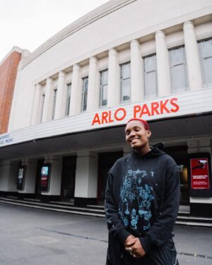 Arlo Parks Instagram - We sold out Hammersmith Apollo?!?! This venue has been a constant in my life - taking the bus past it on my way to school, meeting friends at the McDonald’s in the station opposite before getting into some teenage mischief, locking my bike outside it when I was 16 and cycling around, selling tickets to my basement gigs by hand - that venue was the biggest venue in the WORLD to me - playing it meant you MADE it - this particular full circle moment has cut me in this very special, nostalgic, deep almost painful way - it felt like arriving - thank you thank you thank you ✨
