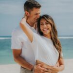 Ashley Argota Instagram - who knew that the guy who spoke only 3 words to me 7 years ago today would now be taking care of me as i grow our child in my belly?! happy #NationalItWasGoodDay to my real life soulmate. in my head we are forever here— carefree, well rested, on our 7th massage of the week, and so so tan on the beaches of bali. i love you & i always will 🤍
