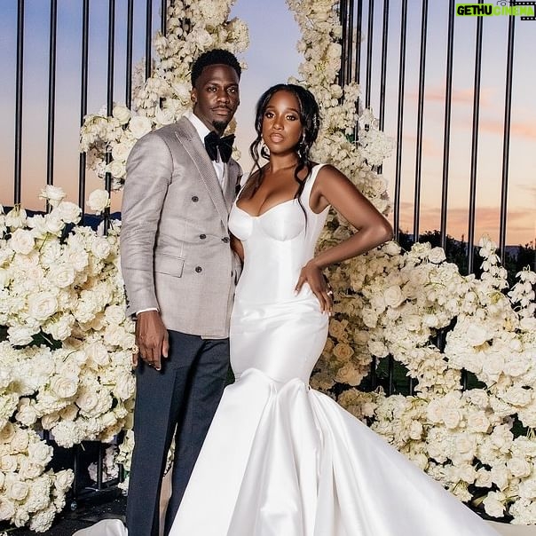 Ashley Blaine Featherson Instagram - Cheers to another year of love, laughter, and endless adventures together! Happy Anniversary Mr & Mrs Featherson-Jenkins 💍 ______ Bride: @ashleyblaine Groom: @mynamedarroll Cinematographer: @bricksgroup Photographer: @stanlophotography Planning & Design: @triciasmithbrown MUA: @kingmalimagic Hair: @nicky_b_on_hair Stylist: @vaingloriousbrides × @vaingloriousbrides_jonathan Custom Wedding Dress: @shopvainglorious @vaingloriousbrides Venue: @hummingbirdnestevents Hair Vines: @lavie.bridal Hair: @monethairco Earrings: @mariaelenaheadpieces Shoes: @aminahjillil Nails: @modernpampersalon Groom’s Suit: @davidson_frere Groom’s Shoes: @gucci Male Grooming: @ronlamb_the1 Brows: @touchedbybiggie Dermatologist: @dr.obioha Trainer: @6ackcity