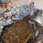 Ashley Cook Instagram - if anything at all feels important to me it is something like this— a small piece of homemade bread shared in a simple piece of foil. small and simple, but not really small or simple. these are the big things. more of this, more of this.
