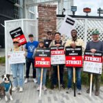 Ashly Burch Instagram - A picture of the Mere Mortals writers unofficial mascot Cody out on the picket line from a few weeks ago. And a picture of the rally last Wednesday. We're still out here, goin' strong!