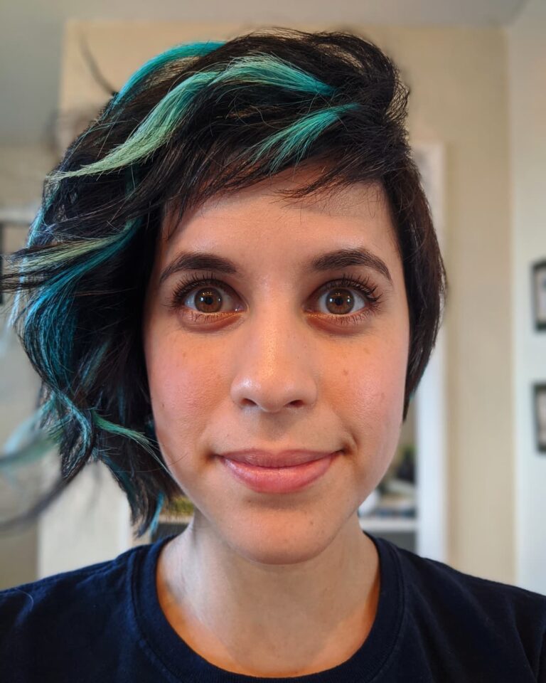 Ashly Burch Instagram - This is what Rachel's hair almost looked like for @mythicquest. If you can believe it, it's actually a wig! I chopped all my hair off before we started filming the second season, so the amazing @abbyroll fashioned this with nothing but grit and ingenuity (and hair). I love that we ended up going with my natural hair, but I still really dig this blue 😍