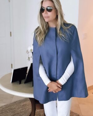 Aviva Drescher Instagram - Hola ! It has been so chilly in Miami I have been able to wear my favorite classic cape by @cape.couture ! So so chic and swipe to see the inside material ! The capes and lining  can be made custom and come in so many styles and fabrics.  You can choose the lining from many stunning fabrics ! Thank me later. 💋