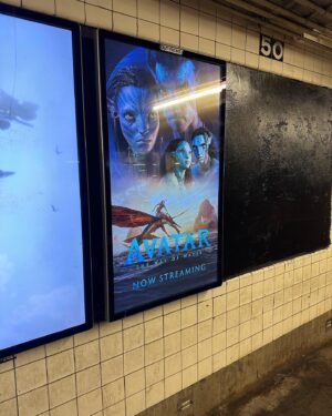 Bailey Bass Instagram - A literal dream come true. Growing up taking the subway to modeling jobs w/ Babulya, I dreamed of one day being on one of the various movie ads plastered on the walls of each stop. To me, taking the train was…and still is so magical. 
This moment is so special to me. Seeing the Avatar TWOW poster never gets old. 
Although some of the standard posters have been replaced by digital screens, this moment is still so so special.
This also happens to be perfect timing because Avatar The Way of Water can now be streamed on Disney  !!!! 💙🐚🌱🤍
#tsireya #avatarthewayofwater